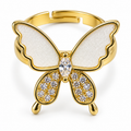 Anillo dorado de mariposa con alas blancas