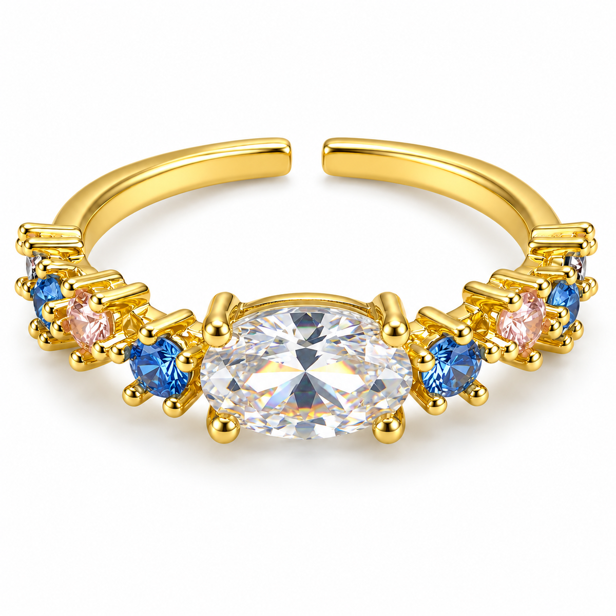 Anillo dorado con centro oval y detalles de colores