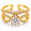 Anillo dorado de lazo y centro redondo