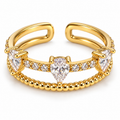 Anillo dorado de gotas y doble banda