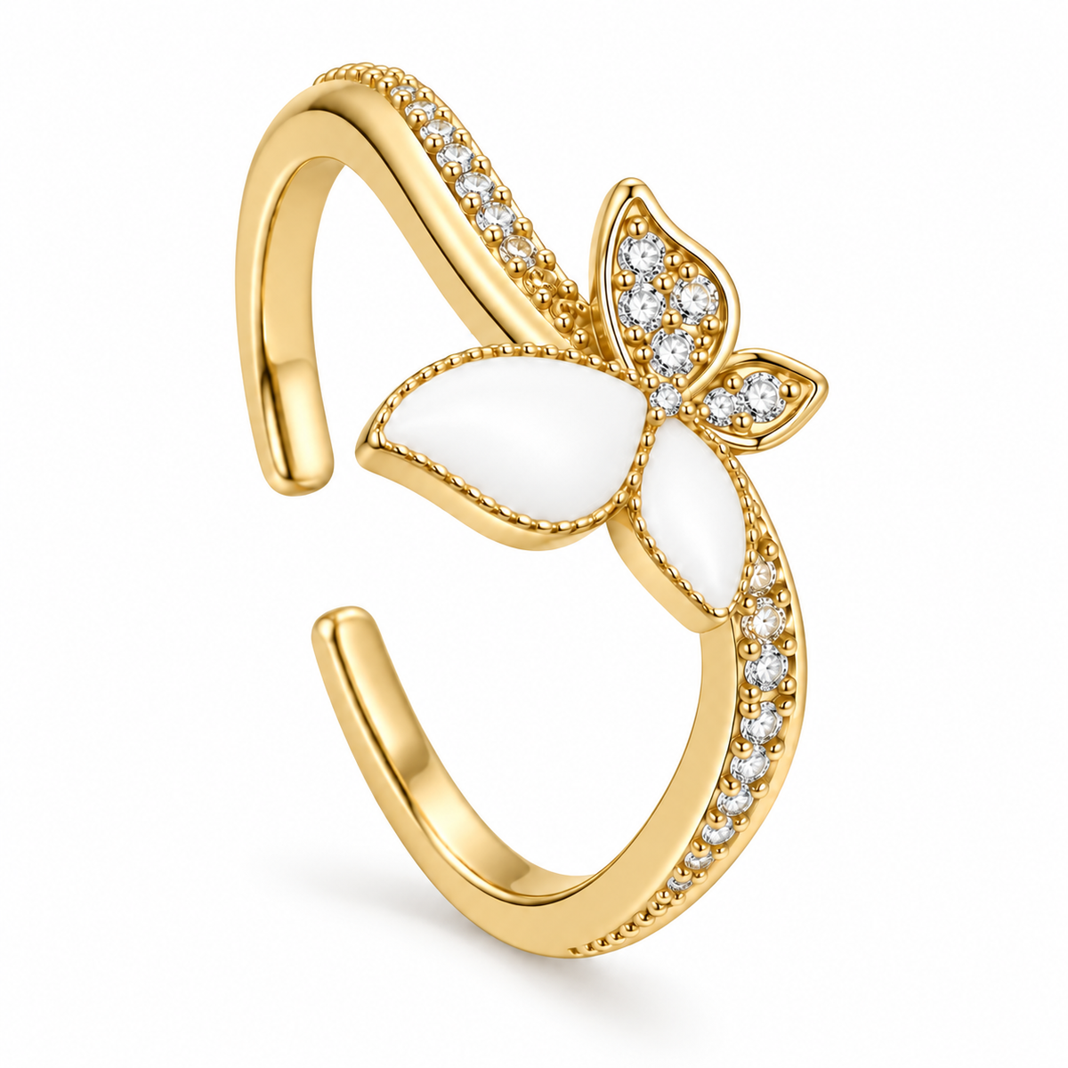 Anillo dorado de mariposa con detalles blancos