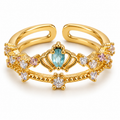 Anillo dorado de centro azul y doble banda