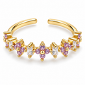 Anillo dorado de flores violetas y detalles rectangulares