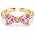 Anillo dorado de lazo rosa