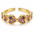 Anillo dorado de mariposas violetas