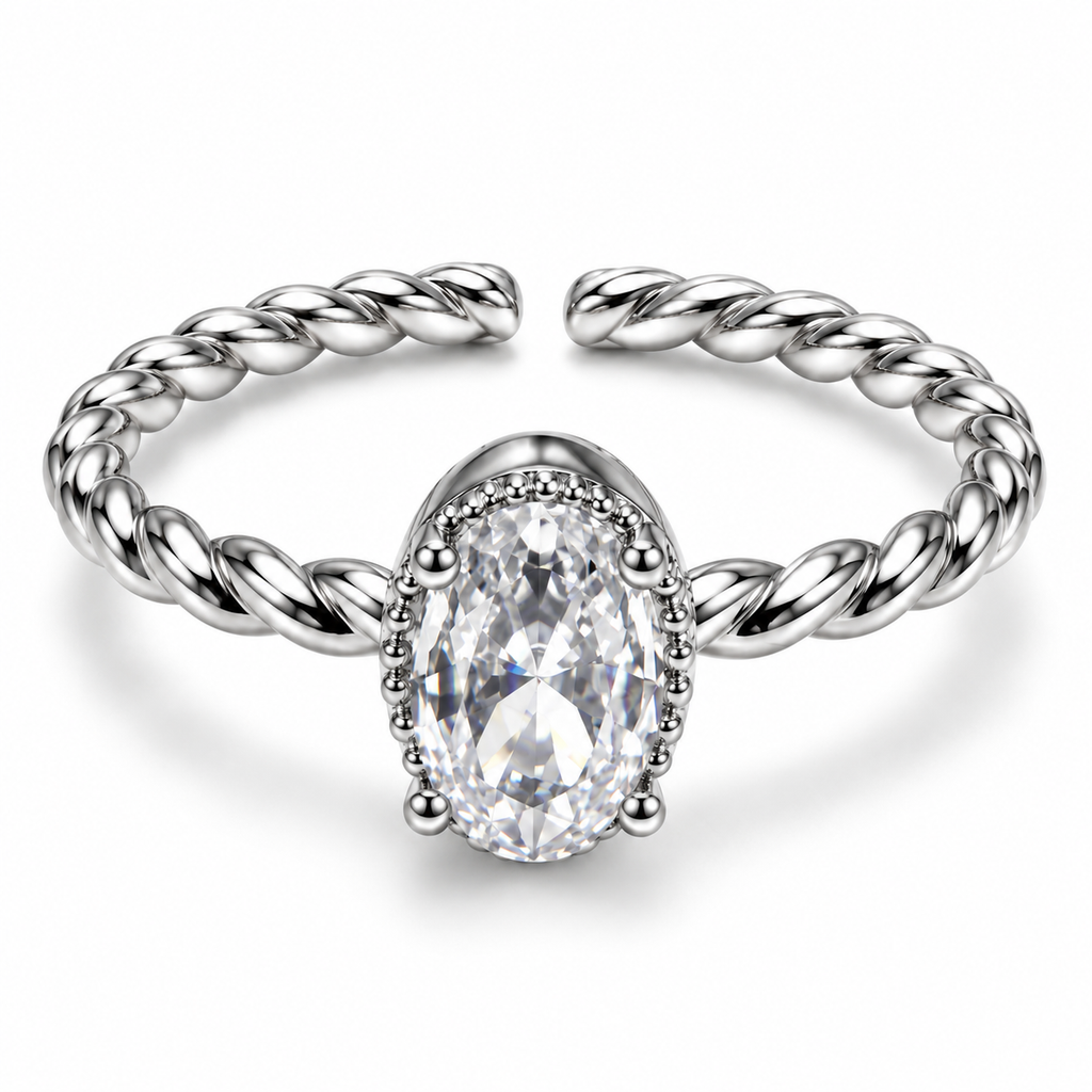 Anillo plateado de centro oval y aro trenzado