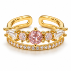 Anillo dorado de centro rosa y doble banda
