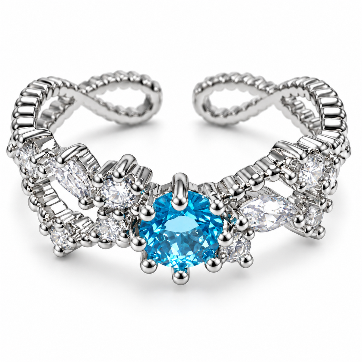 Anillo plateado de centro azul y bandas onduladas