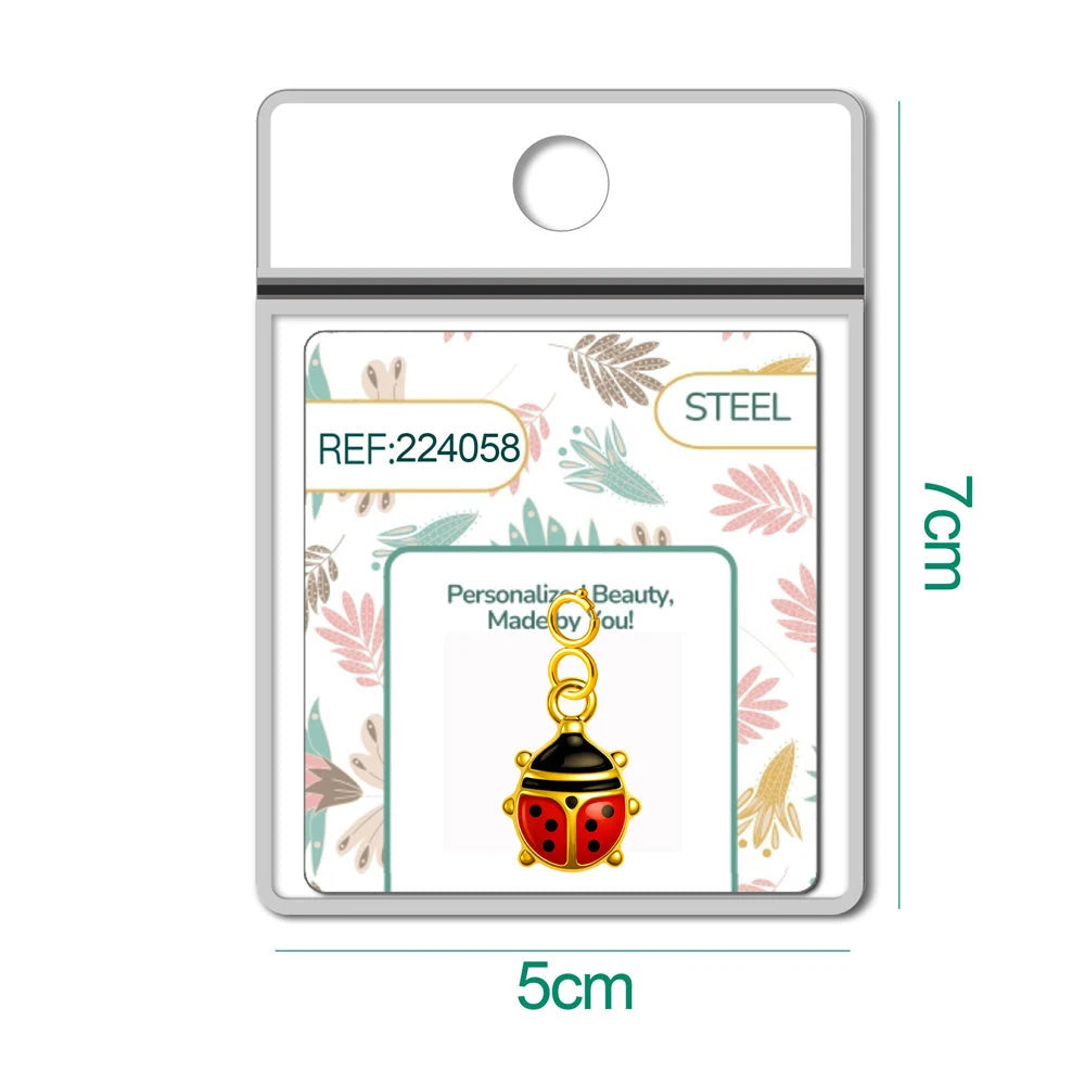 Charm Acero Dorado Chapado Oro 14K Mariquita con Cierre detalle