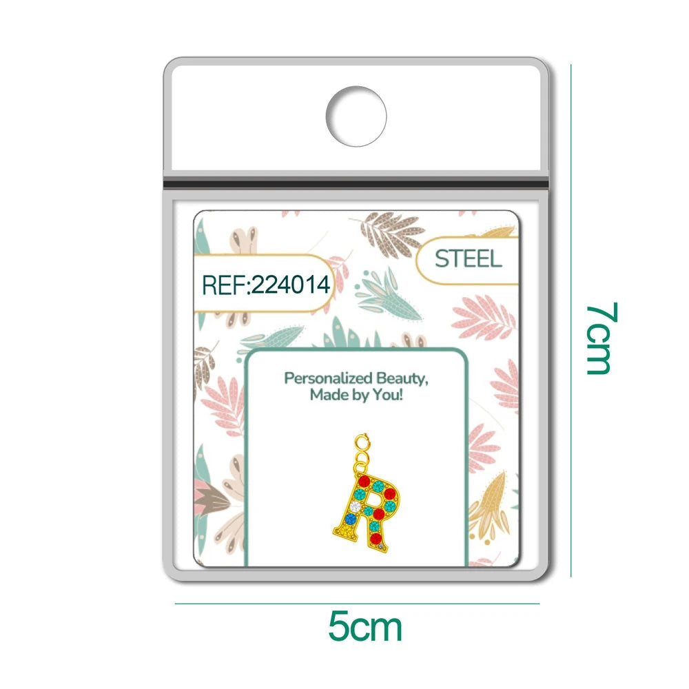 Charm Acero Dorado con Circonita Letra R Multicolor con Cierre detalle