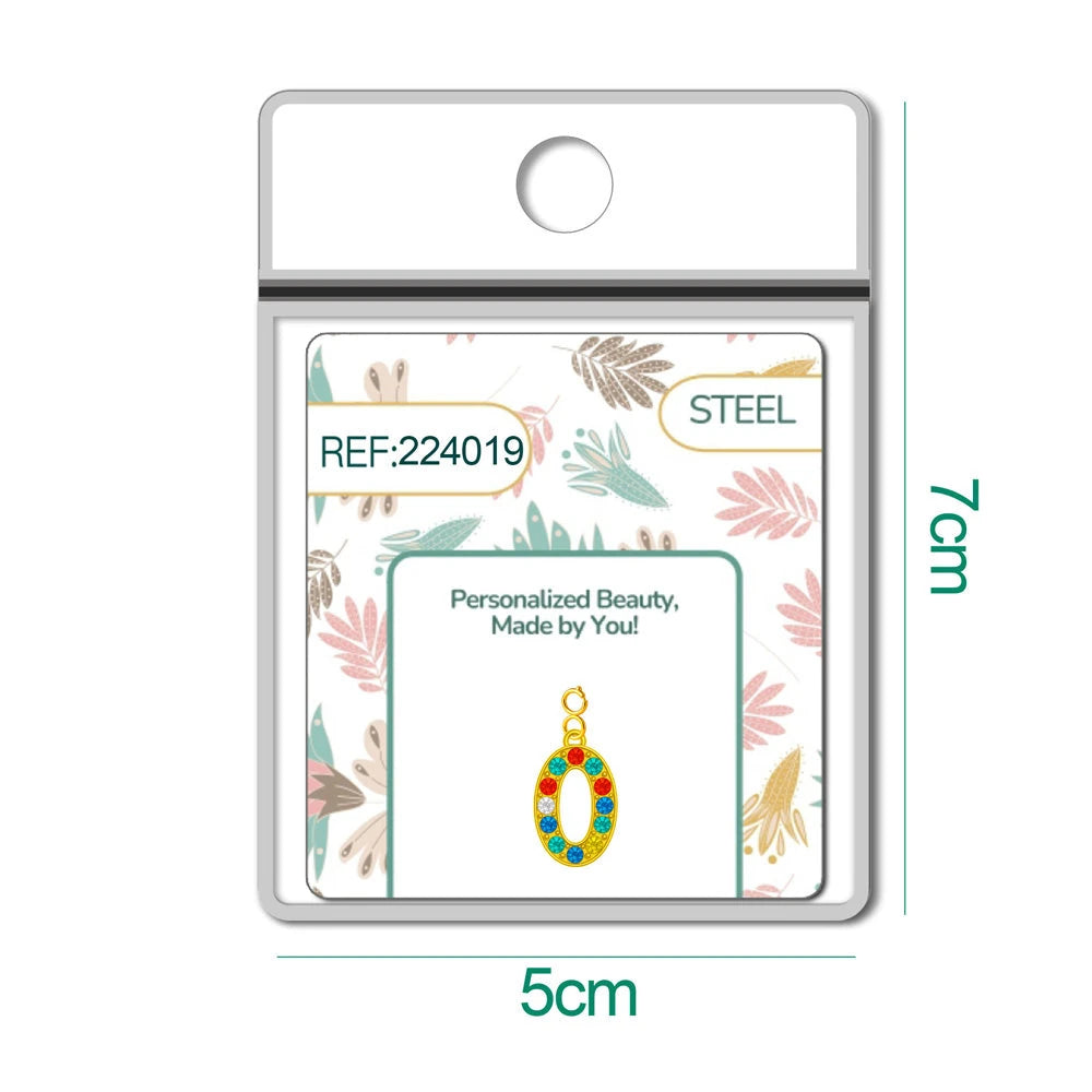 Charm Acero Dorado con Circonita Número 0 Multicolor con Cierre detalle