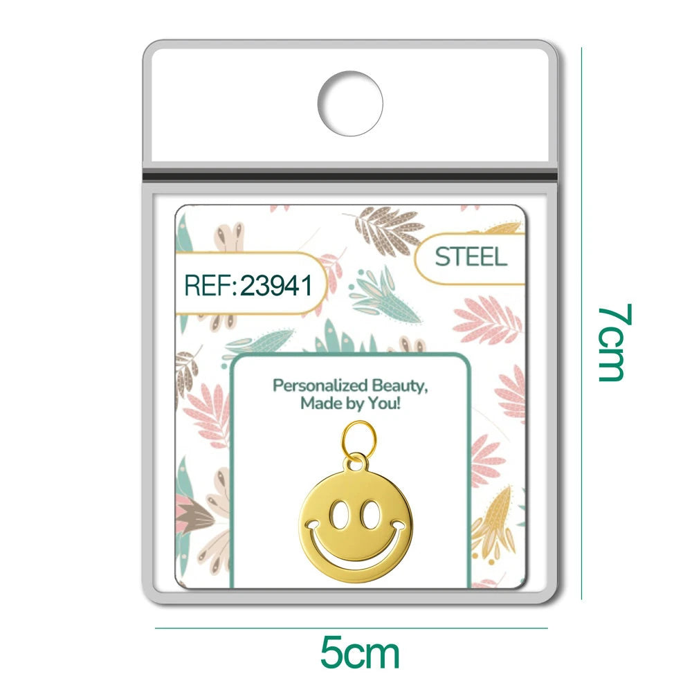 Charm Acero Dorado Carita Sonriente en Blíster