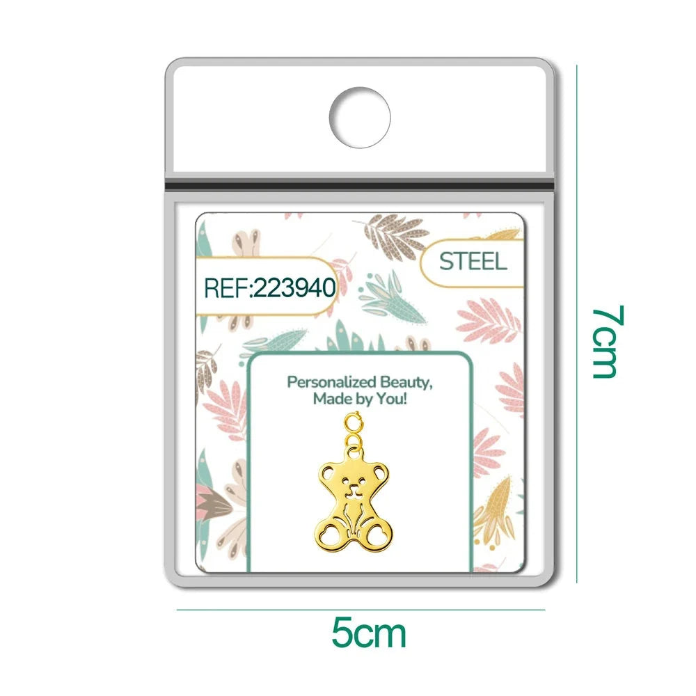 Charm Acero Dorado con Cierre Osito detalle