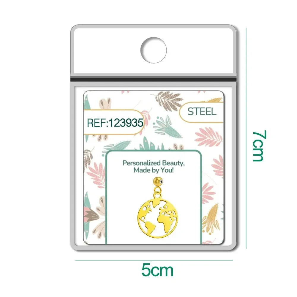Charm Acero Dorado Mapamundi detalle