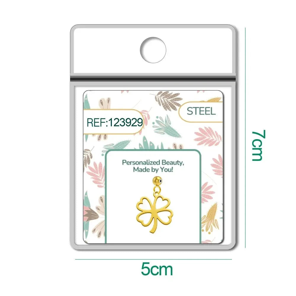 Charm dorado de trébol de corazones con bola de acero con goma en blíster