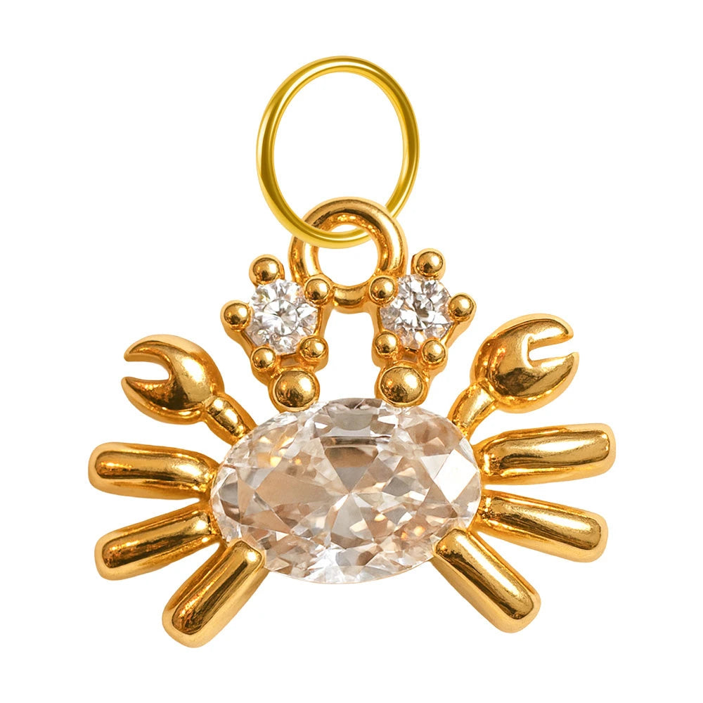 Charm colgante dorado de cangrejo con circonita ovalada y aro de acero