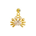 Charm colgante dorado de cangrejo con circonita ovalada y bola de acero con goma