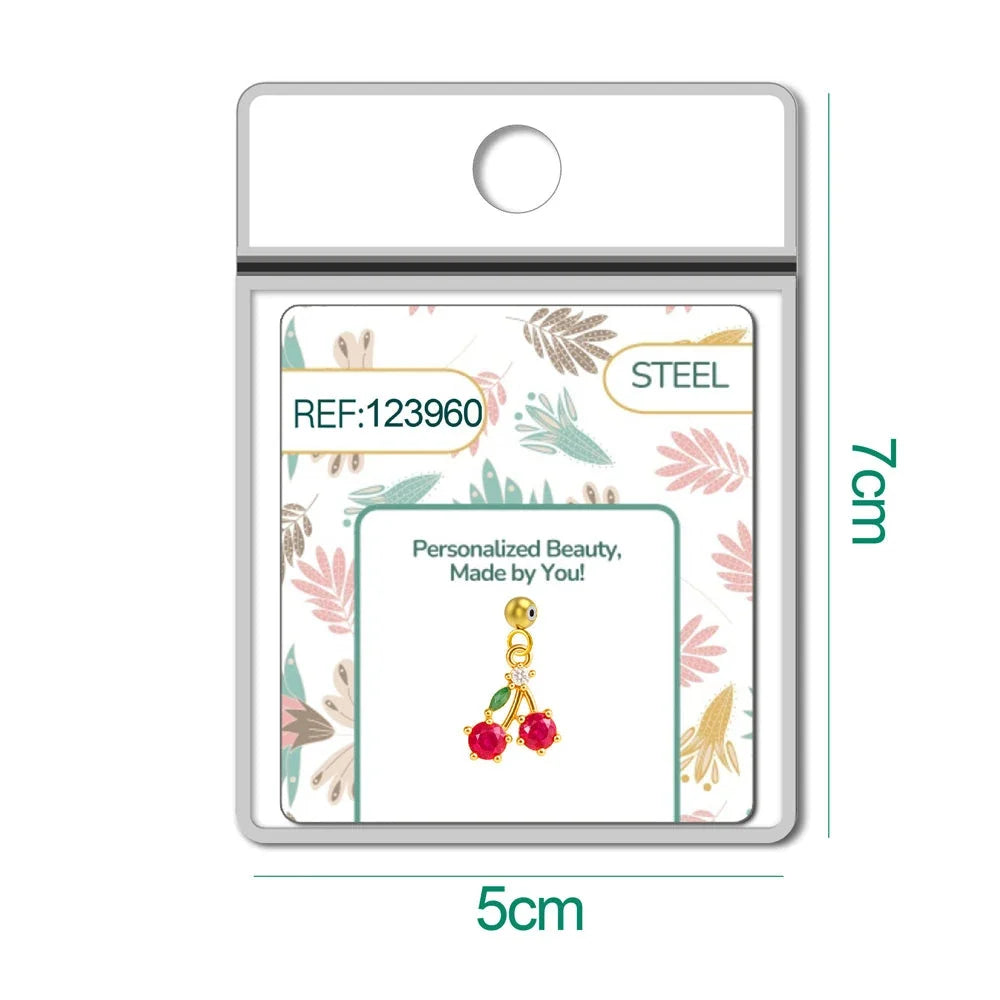 Charm de dos cerezas rojas dorado con bola de acero con goma en blíster