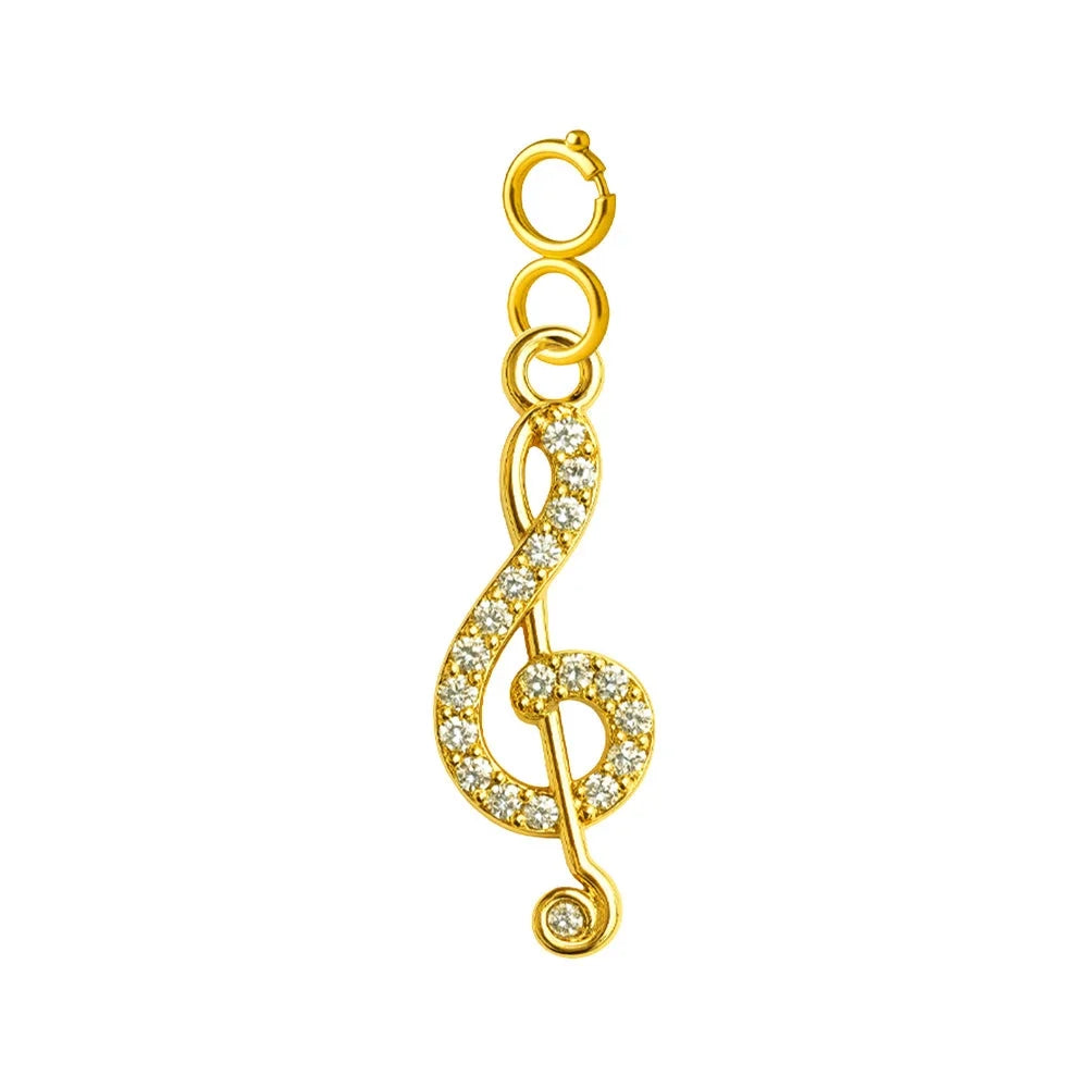 Charm colgante dorado de clave de sol con circonitas y cierre de acero