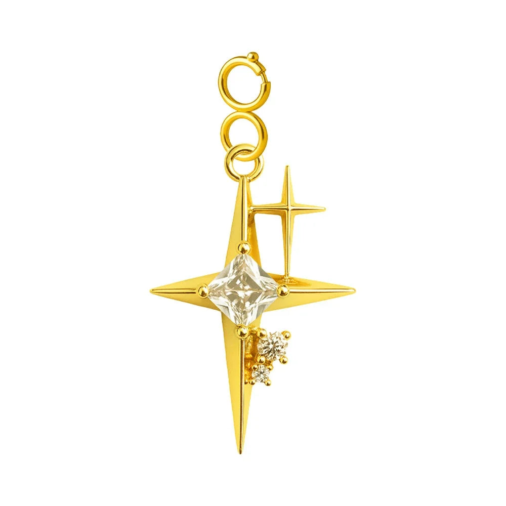 Charm colgante de estrella polar dorada con circonitas y cierre de acero