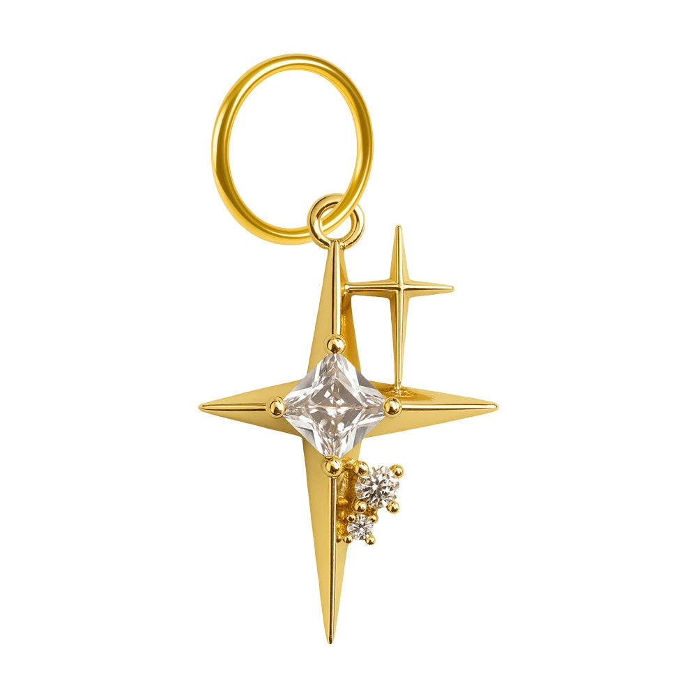 Charm colgante de estrella polar dorada con circonitas y aro de acero