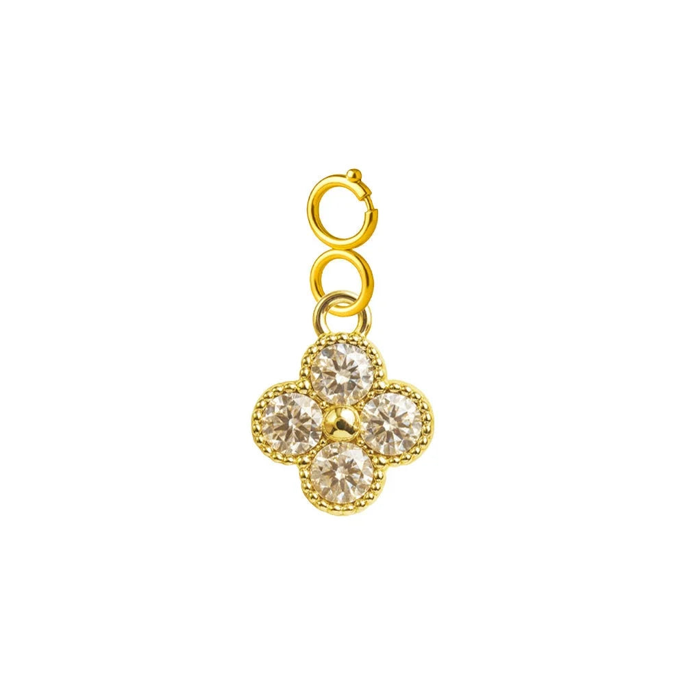 Charm colgante dorado de flor de cuatro pétalos con circonitas y cierre de acero