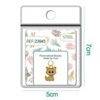 Charm de gato dorado con circonitas en blíster, vista frontal