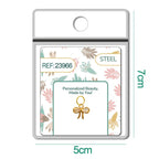 Charm de lazo dorado con circonitas en blíster, vista frontal
