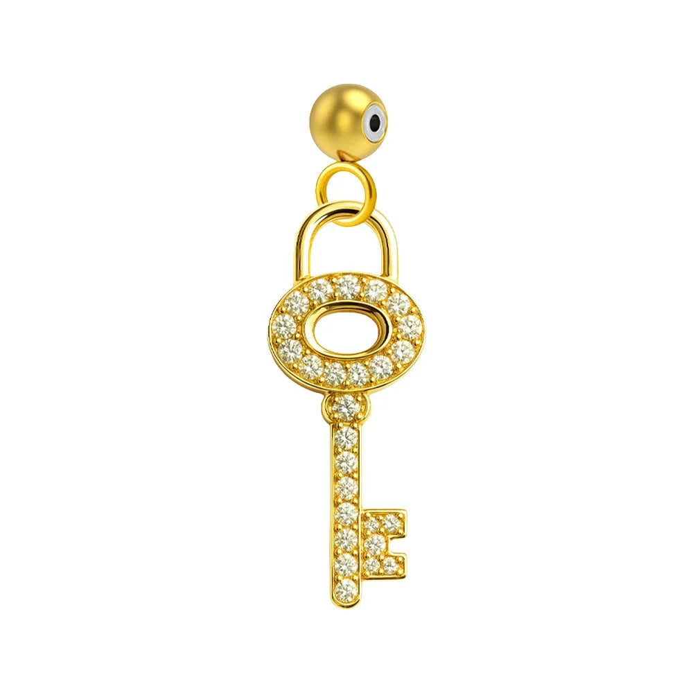 Charm colgante dorado de llave con circonitas y bola de acero con goma