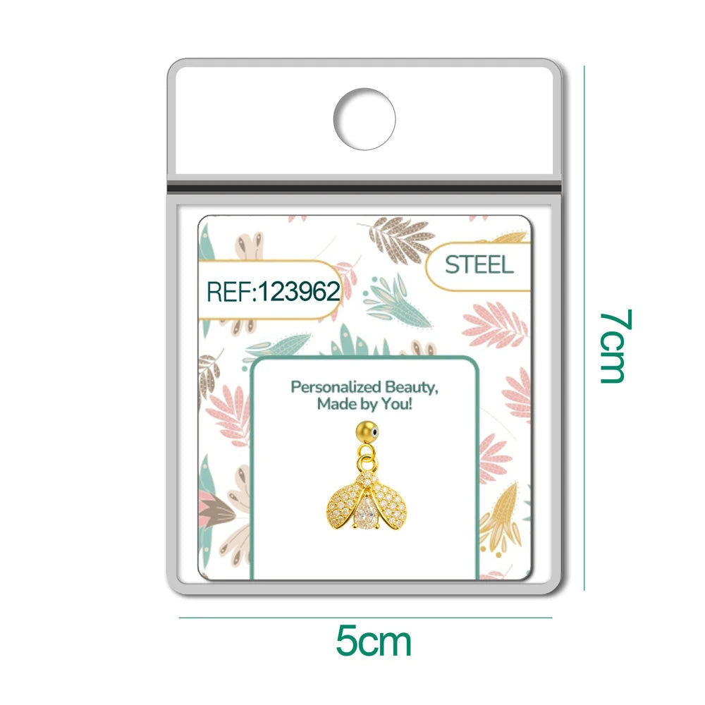 Charm Cobre Chapado Oro 14K con Circonita Mariposa Gota detalle