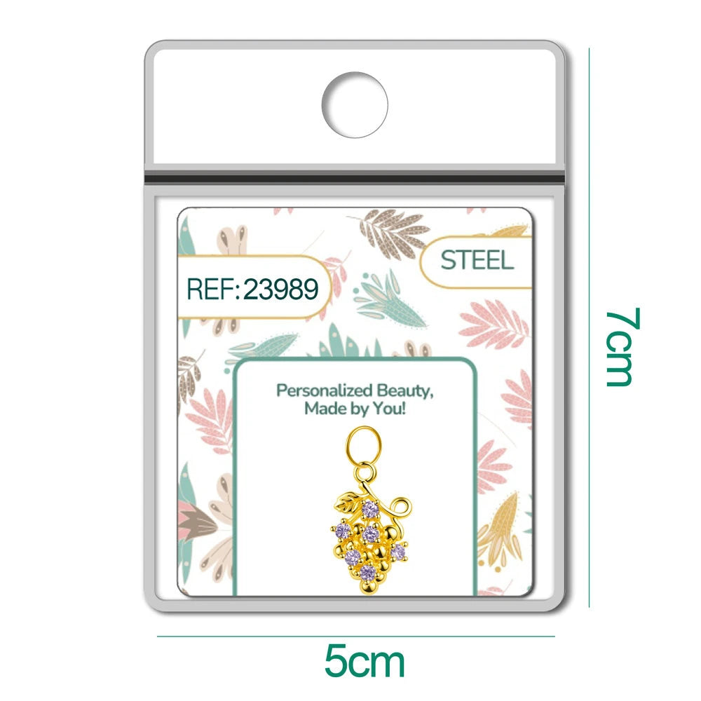 Charm dorado de racimo de uvas con circonitas lila con aro de acero, en blíster
