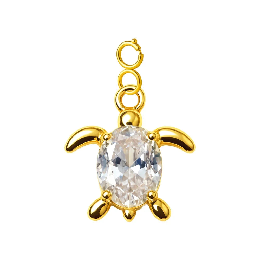 Charm colgante dorado de tortuga con piedra ovalada y cierre de acero