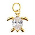 Charm colgante dorado de tortuga con piedra ovalada y aro de acero