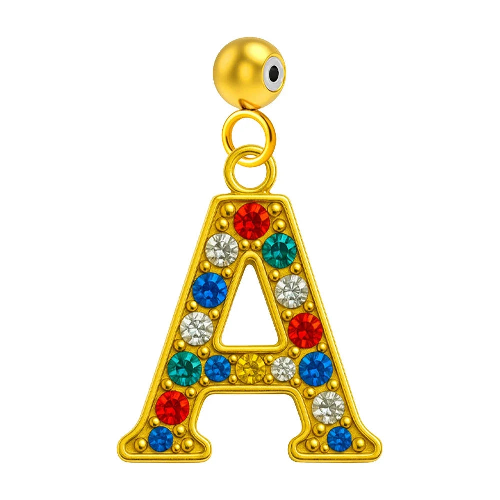 Charm colgante de letra A con detalle de circonita, acabado dorado y bola de acero con goma