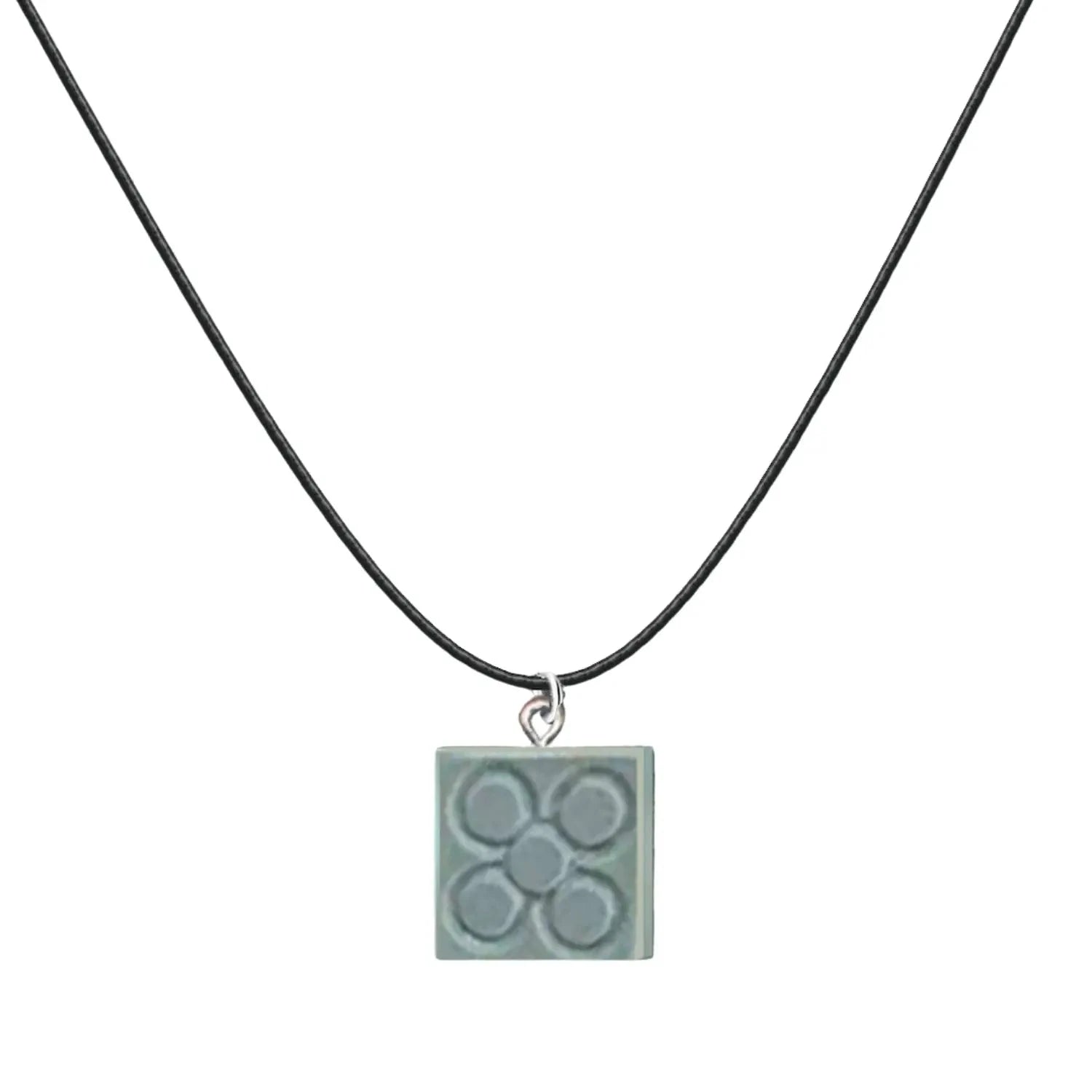 Colgante Flor de Barcelona con Cordon Y Acero textura