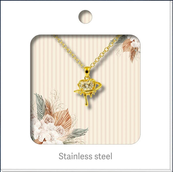 Colgante Planeta Y Corazón Dorado 14K con Circonitas acabado