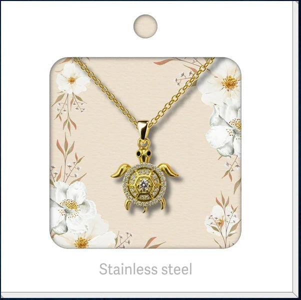 Colgante Timón con Alas Dorado detalle
