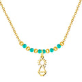 Collar gargantilla con colgante silueta Virgen de Covadonga acero dorado y cuentas color turquesa