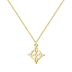 Collar de acero inoxidable con acabado dorado y colgante silueta del Nudo de Bruja. Diseño calado, elegante y luminoso.