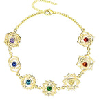 Pulsera 7 chakras dorada acero inoxidable mujer con cristales de colores y símbolos de flor de loto