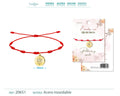 Pulsera roja de 7 nudos con colgante central de ojo turco dorado en acero inoxidable y cordón ajustable.