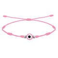 Pulsera rosa de 7 nudos con amuleto central de ojo turco rosa y cuentas plateadas en cordón ajustable.
