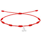 Pulsera de 7 nudos roja con trisquel plateado en acero inoxidable