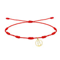 Pulsera de hilo rojo 7 nudos con charm de silueta calada de la Virgen de la Fuensanta en acero dorado