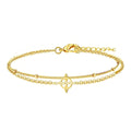 Pulsera Doble Cadena con Nudo de Bruja en Acero Dorado