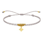 Pulsera Hilo Encerado con Colgante Nudo de Bruja en Acero Dorado