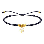 Pulsera Hilo Encerado con Colgante Trebol en Acero Dorado
