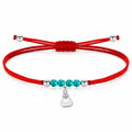 Pulsera de hilo rojo ajustable con colgante de fallera en tono plateado