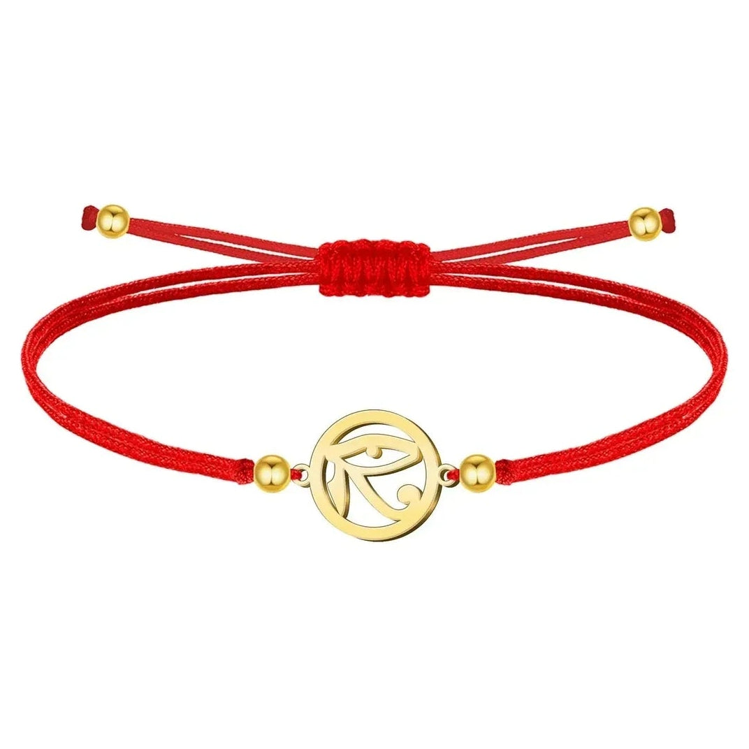 Pulsera Ojo de Horus Hilo Rojo Acero Dorado