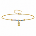 Pulsera Virgen del Pilar multicolor de acero dorado sobre fondo blanco